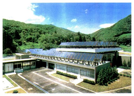 A solar-heated hot water supply system is an example of harnessing natural energy.