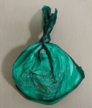 Plastic bag toilets contain a water-absorbent sheet inside a sealed plastic bag. To use, open the mouth of the plastic bag along the perforations. The torn-off portion of the bag is used to tie the mouth of the plastic bag after use.