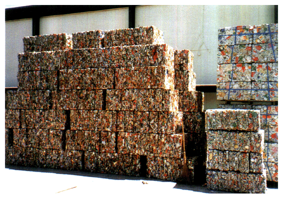 Piles of conpressed cans for recycling (left, steel cans; right, aluminium cans)
