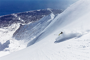 Skiing towards the sea