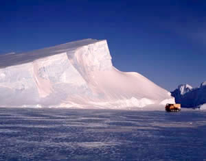 Iceberg and a Snow Mobile
